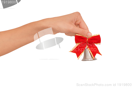 Image of hand bell with red bow