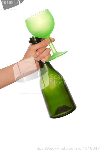 Image of green bottle and wine glass