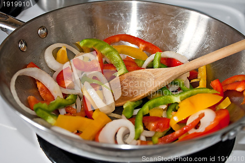 Image of Stir Frying Vegetables in a Wok