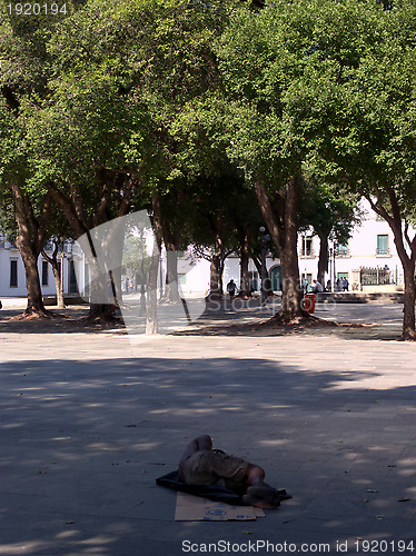 Image of Tne beggar and the park