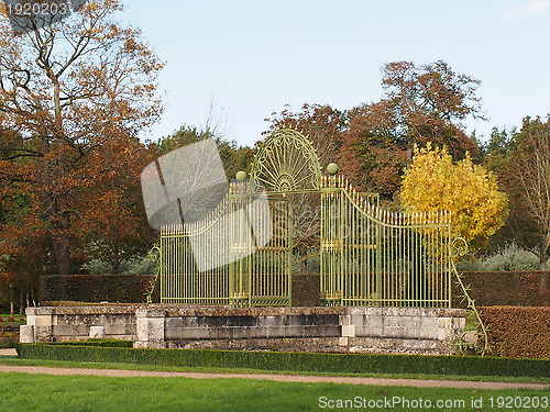 Image of Green and gold forged iron gate, France