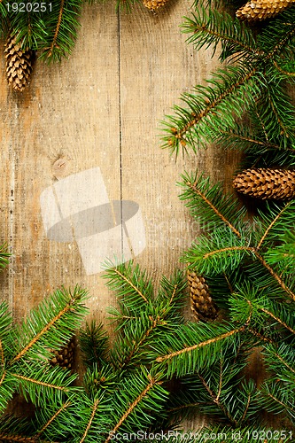 Image of christmas fir tree with pinecones 