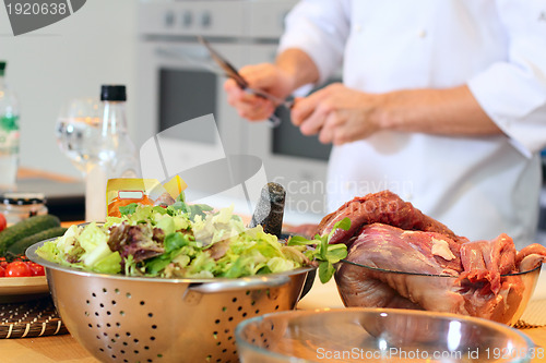 Image of Chef cook preparing for cooking