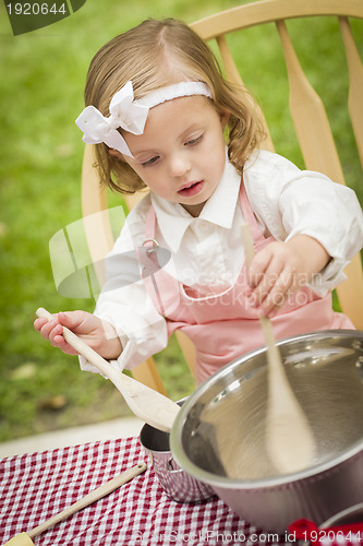 Image of Adorable Little Girl Playing Chef Cooking