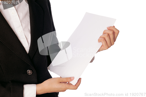 Image of holds the white blank paper