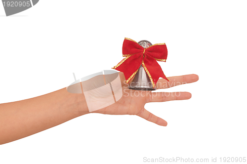 Image of hand bell with red bow