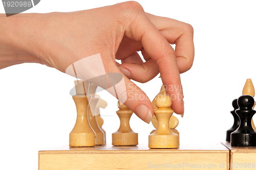 Image of woman plays chess