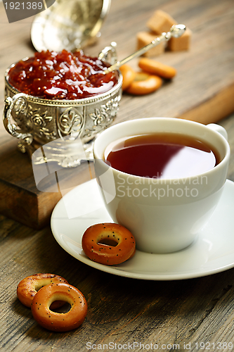 Image of Tea with small bagels and fig jam.