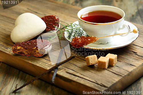 Image of Ginger biscuits and a cup of tea.