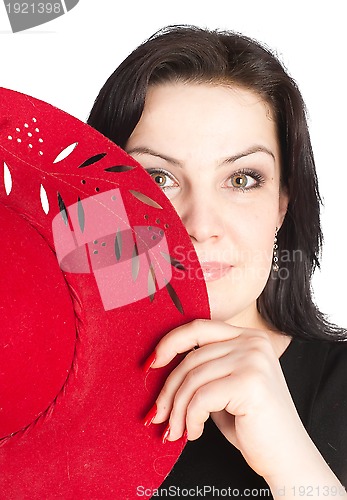 Image of young beautiful woman with red hat