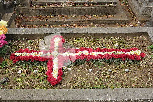 Image of cross made with flowers