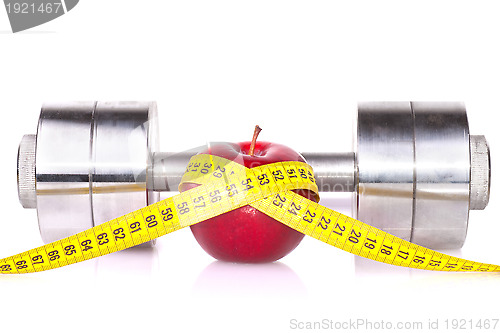 Image of Dumbbell and an apple