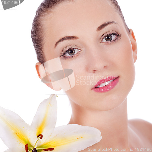 Image of young beautiful woman portrait with white flower