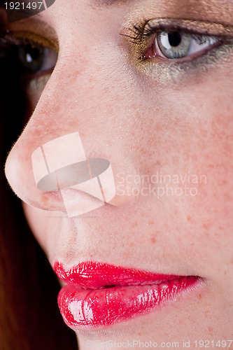 Image of beautiful young woman portrait with freckles