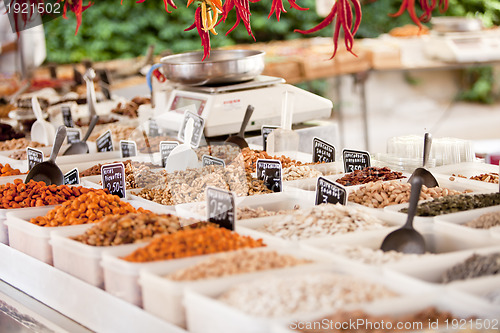 Image of variation of nuts on market outdoor in summer