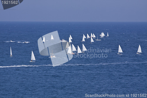 Image of sailboat sport regatta on blue water ocean summer