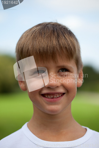 Image of Young boy looking up