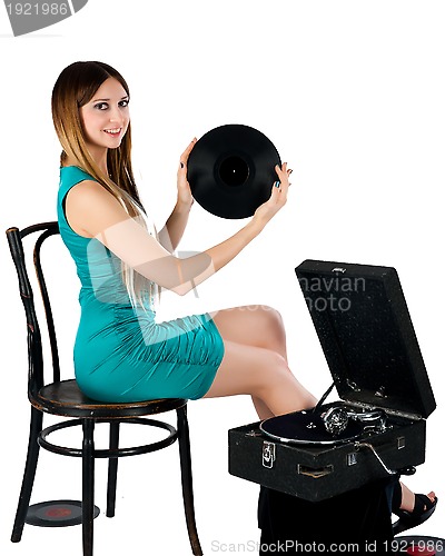 Image of Pretty woman with gramophone