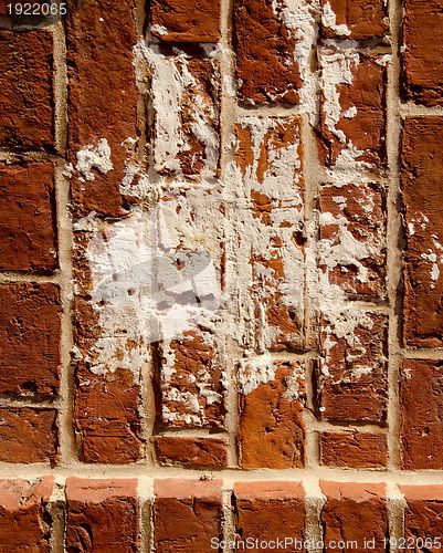 Image of Vintage dirty red brick wall background closeup 