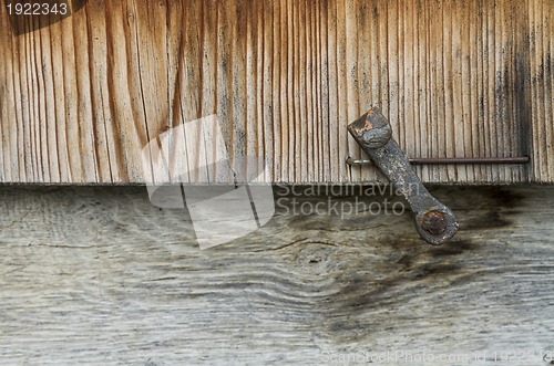 Image of detail of wooden window shutter