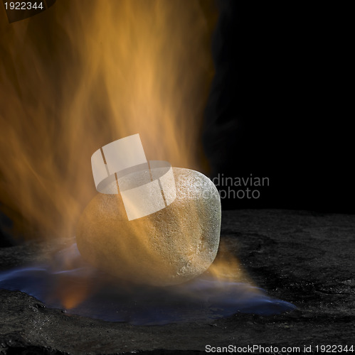 Image of burning stone