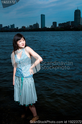 Image of Asian girl at river