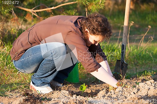 Image of pretty woman in garden