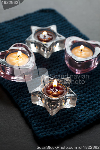 Image of Candles on blue mat