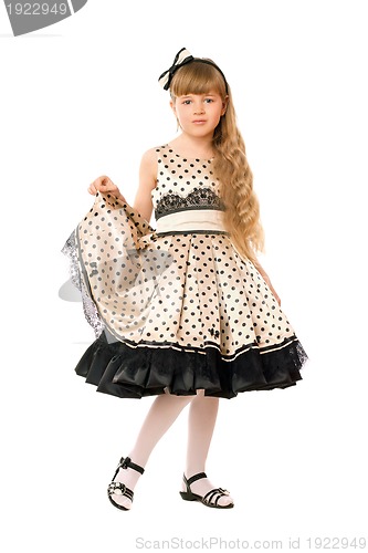 Image of Cute little girl in a dress