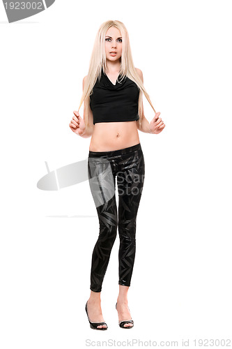 Image of Pretty young blonde in black leggings