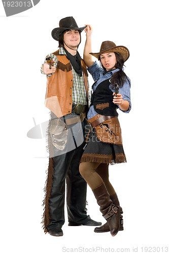 Image of cowboy and cowgirl with a guns