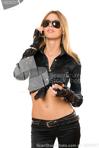 Image of beautiful young blonde with a two phones