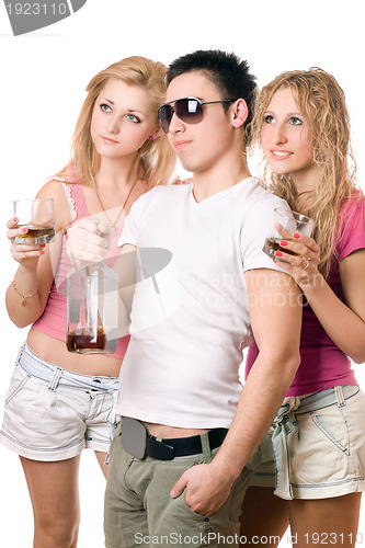 Image of Young people with a bottle of whiskey. Isolated on white