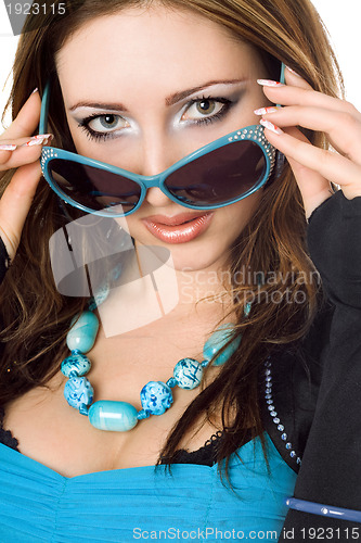 Image of Closeup portrait of young woman in sunglasses