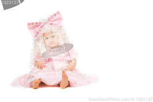 Image of Baby girl in a pink dress. Isolated