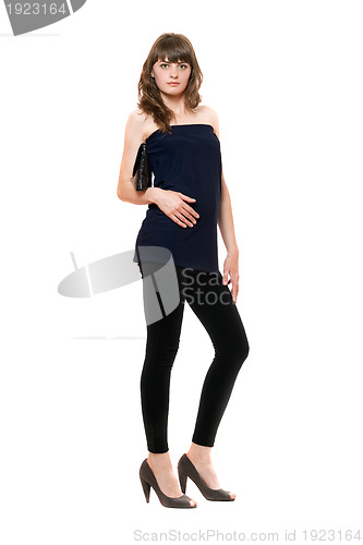 Image of Attractive girl in a black leggings. Isolated