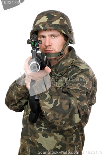 Image of Soldier aiming a rifle. Closeup