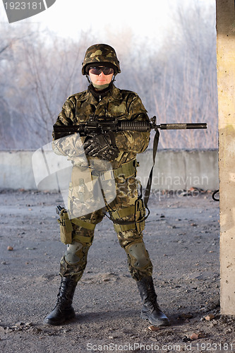 Image of Dangerous guy with a rifle