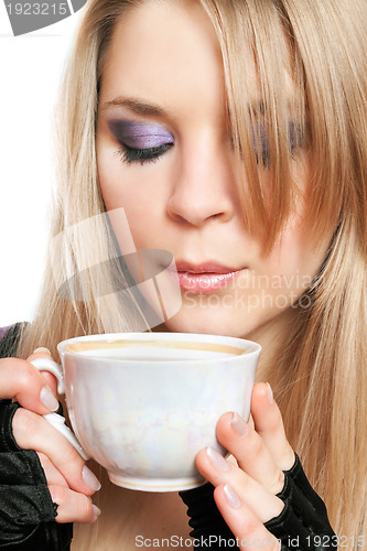 Image of Beautiful blonde with a cup of tea. Isolated