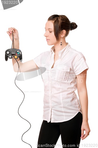 Image of Charming brunette girl with a joystick