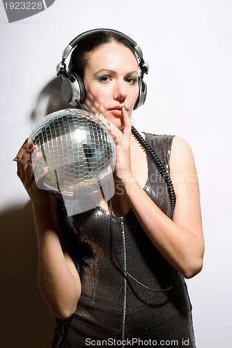 Image of Portrait of nice brunette with a mirror ball