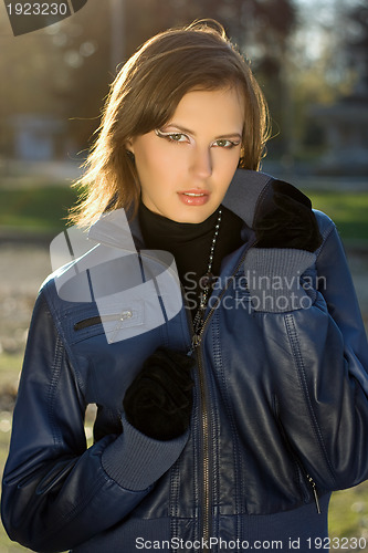 Image of girl in autumn park