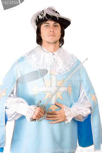 Image of man with a sword dressed as musketeer