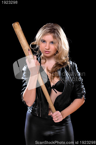 Image of nice young woman with a bat