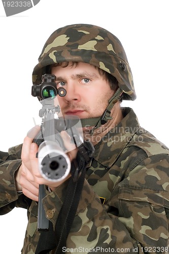Image of Armed soldier aiming m16