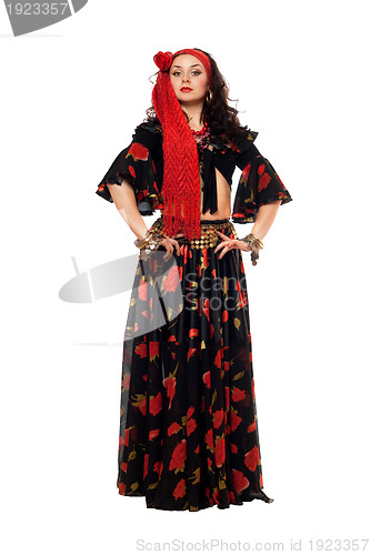 Image of Passionate gypsy woman in a black skirt