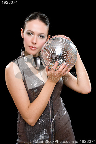 Image of Portrait of beautiful young brunette with a mirror ball