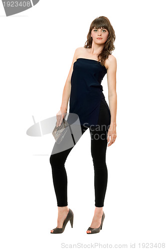 Image of Nice young woman in black leggings 