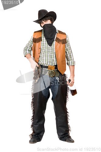 Image of Cowboy with a bottle of whiskey