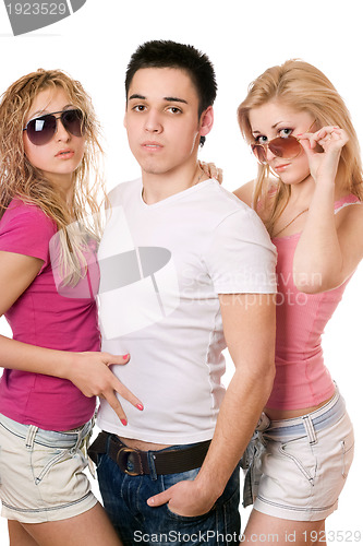 Image of Portrait of a two sensual women and handsome young man